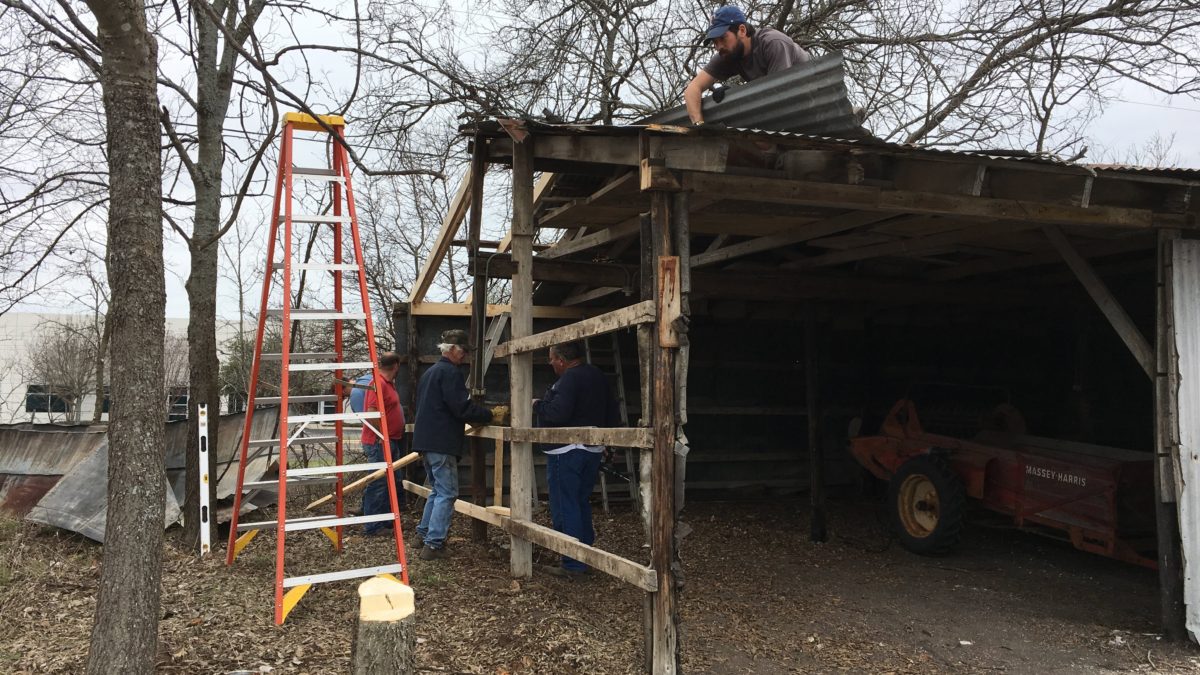 Old barn starting to go back together